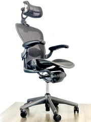 Herman Miller Aeron - Size: B - w/ Headrest for Users 5' 10" and Over - Black/Black - Fully Featured w/ Fully Adjustable Arms - Certified Pre-Owned