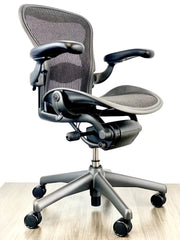 Herman Miller Aeron - Size: A - Black/Black - Fully Featured w/ Fully Adjustable Arms - Certified Pre-Owned